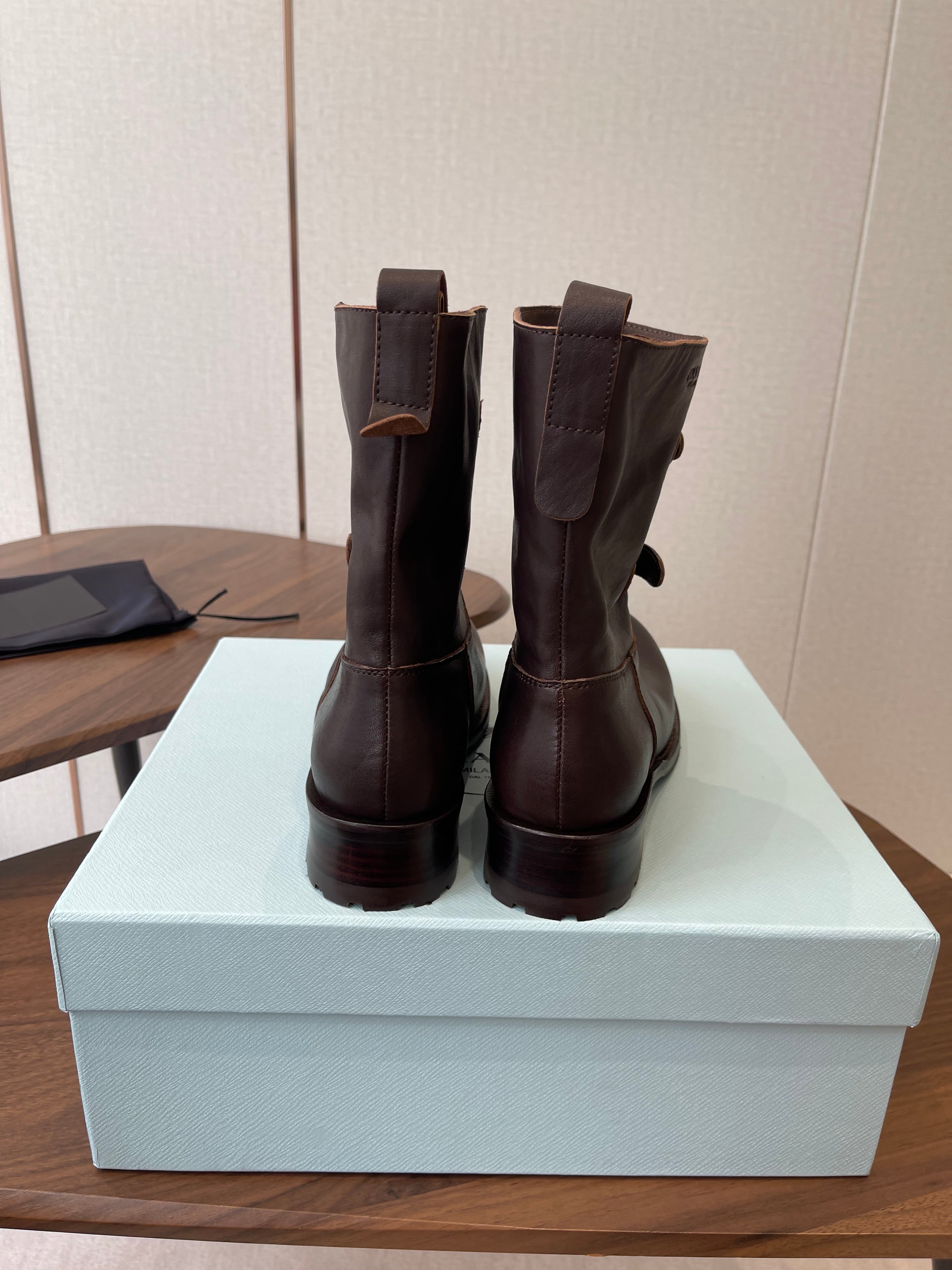 PRADA 25S TWO-BUTTON COWBOY BOOTS IN RK BROWN CALFSKIN WITH SILVER HARDWARE