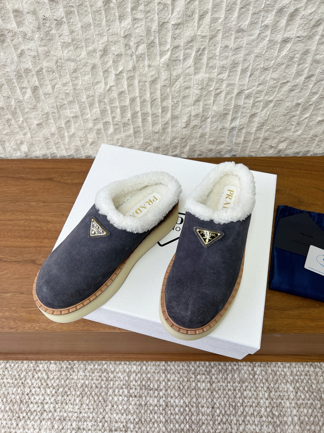 PRADA 25S PLATFORM FUR-LINED MULES IN RK GREY SUEDE