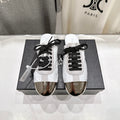 PRADA 25S MULES IN WHITE WITH METAL TOECAP