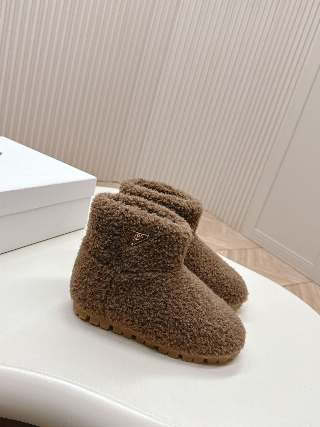 PRADA SNOW ANKLE BOOTS IN WOOD BROWN SHEARLING
