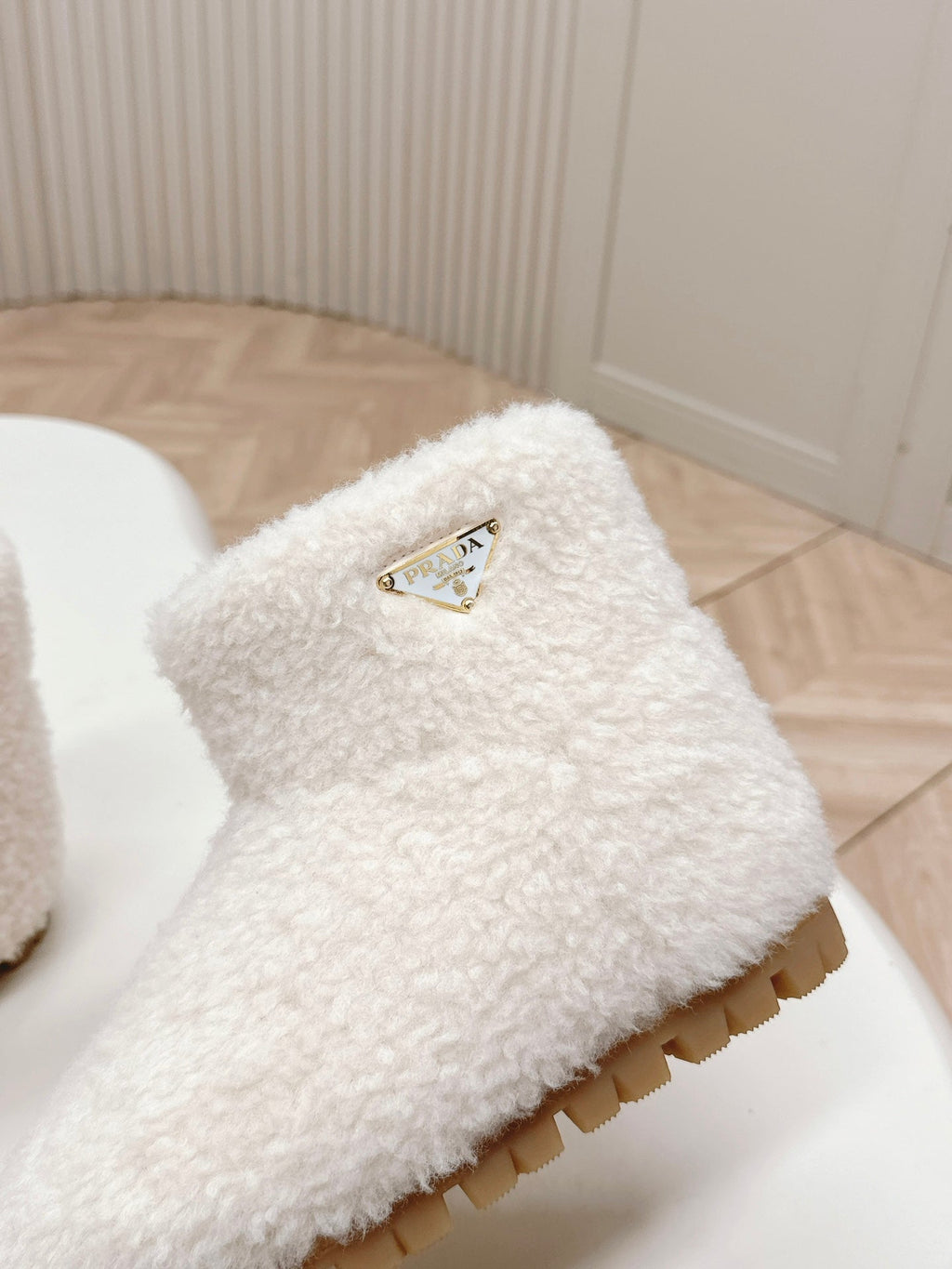 PRADA SNOW ANKLE BOOTS IN WHITE SHEARLING