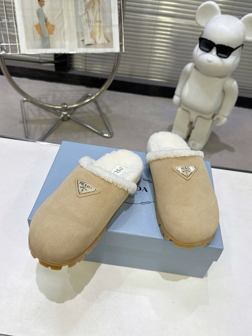 PRADA 25S FUR-LINED MULES IN BEIGE SUEDE