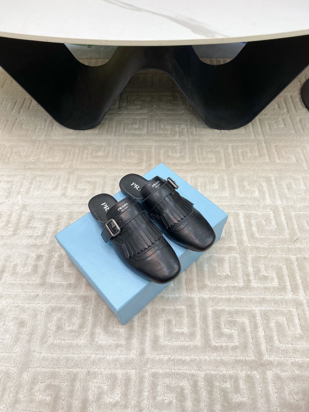 PRADA TASSEL MULES IN BLACK LAMBSKIN