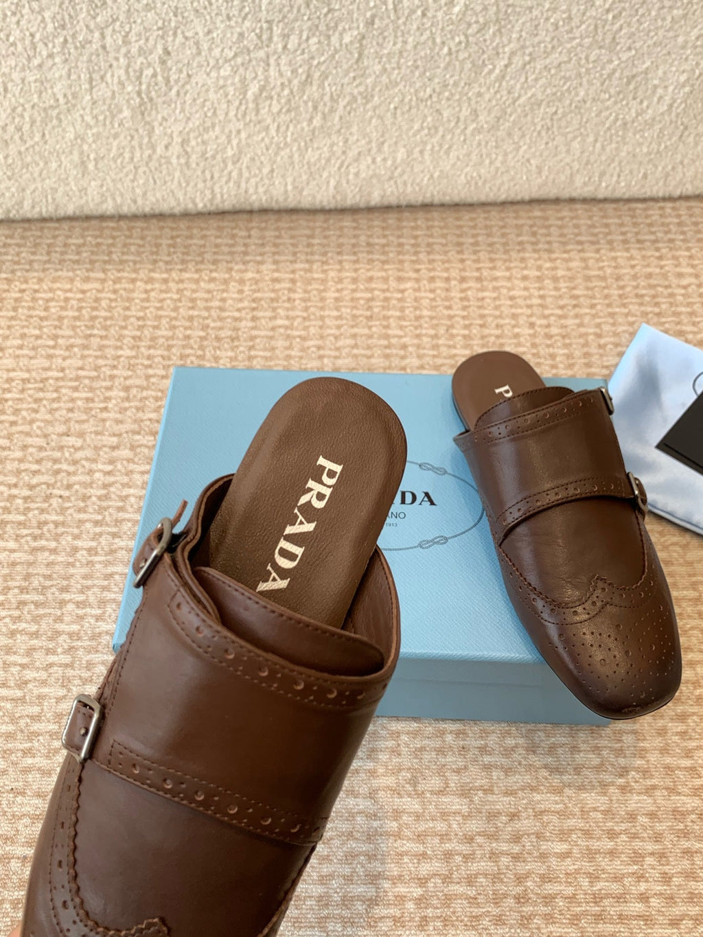 PRADA DOUBLE MONK MULES IN RK BROWN CALFSKIN