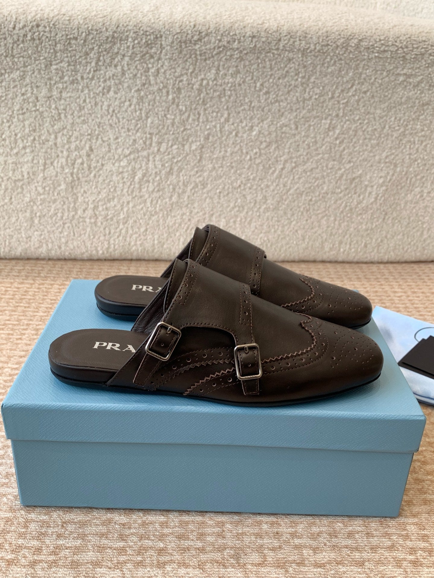PRADA DOUBLE MONK MULES IN WALNUT BROWN CALFSKIN