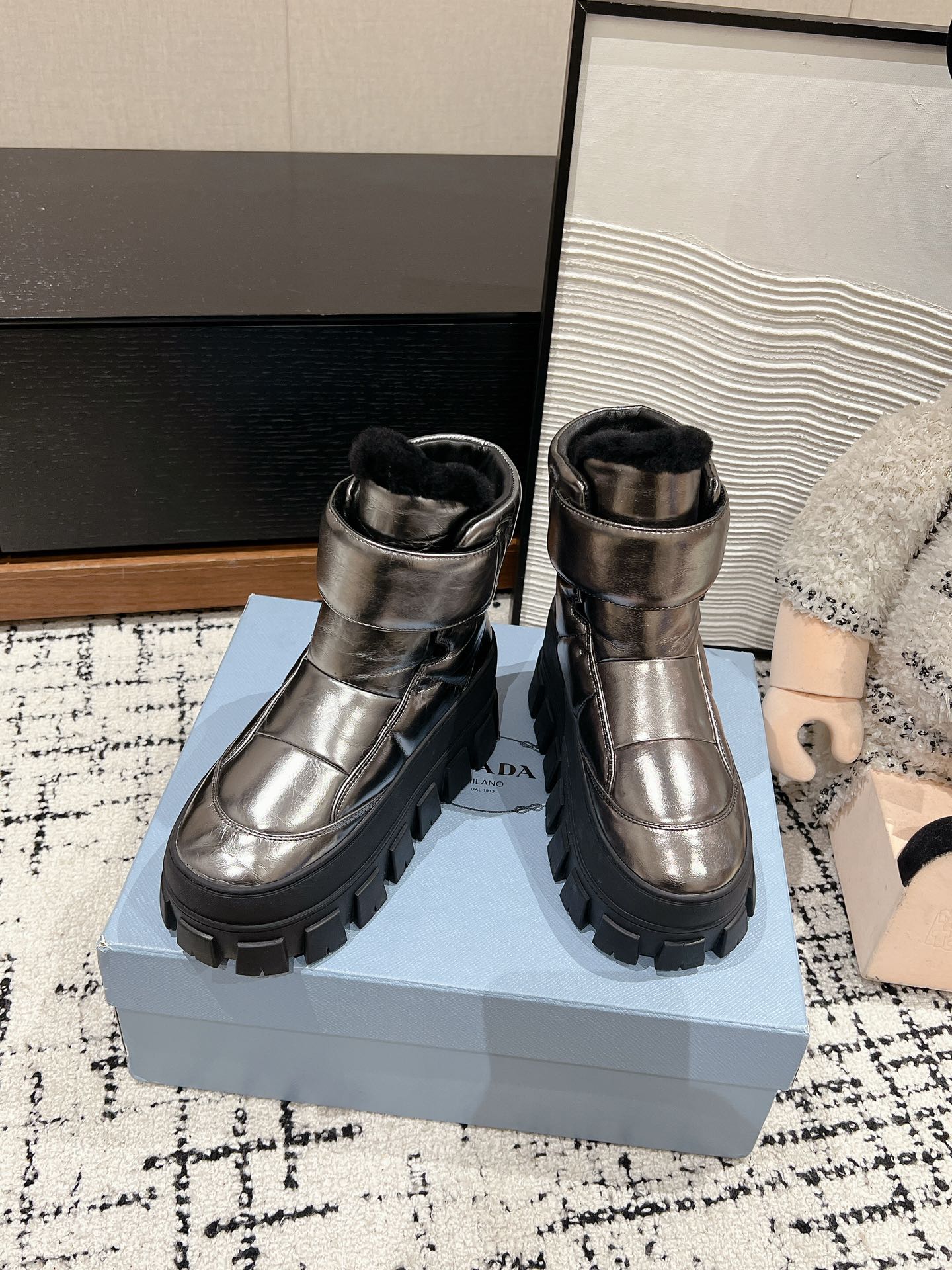 PRADA MONOLITH ANKLE BOOTS WITH STRAP IN METALLIC GRAY CALFSKIN AND FLEECE LINING