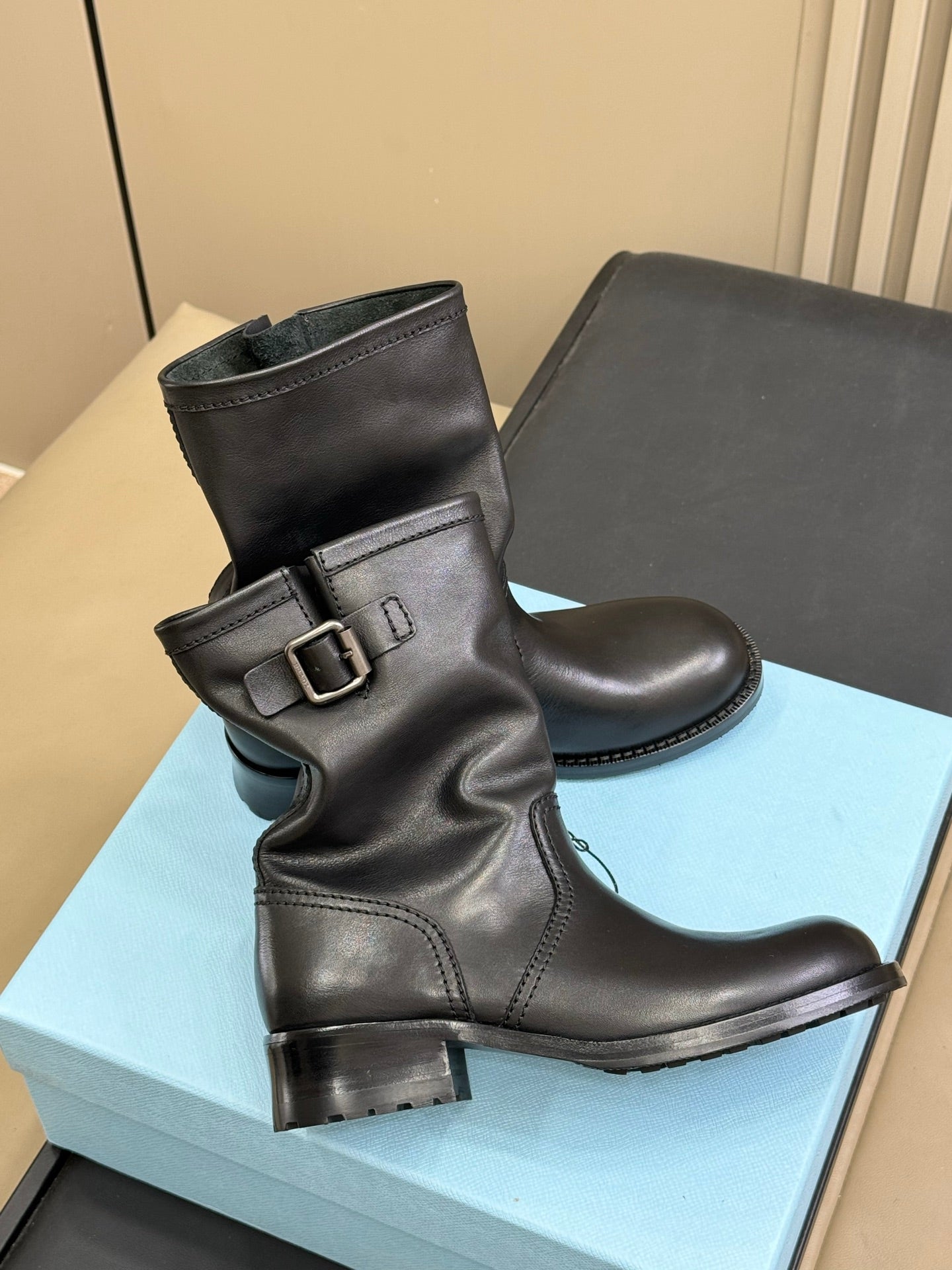 PRADA 25S ANKLE BOOTS IN RK BLACK BROWN CALFSKIN